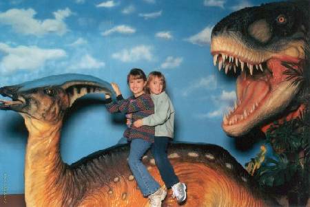 the sisters with parasaurolophus and t-rex