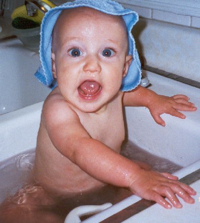 having his bath in the sink