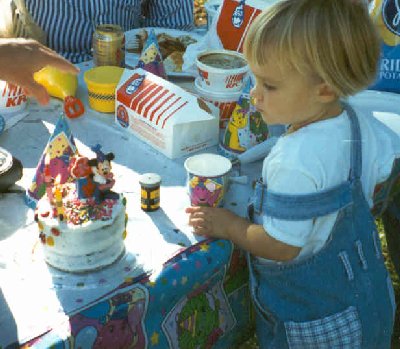 grace second birthday with cake