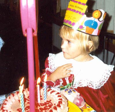 grace fourth birthday with cake