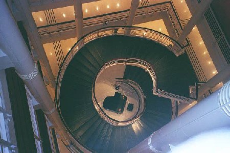 cool circular stairs and a baby grand