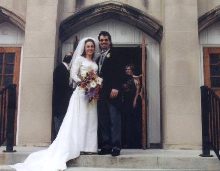 on the church steps after the ceremony